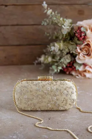 Elan Gold Silk Capsule Clutch