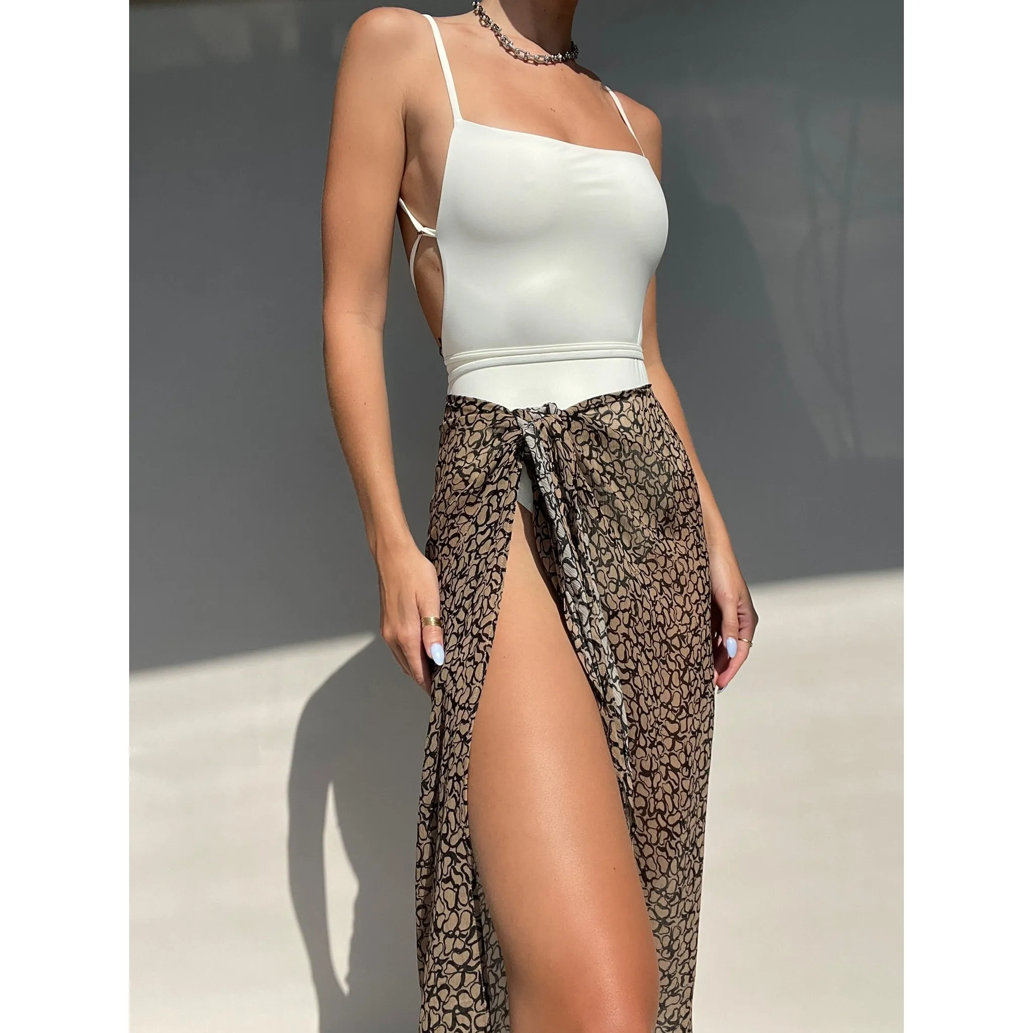 THE K.M. TIE ONE PIECE